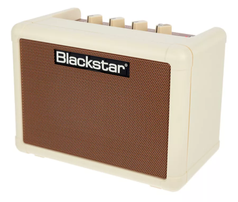Cream-coloured Blackstar Fly 3 mini guitar amp with brown grille and top-mounted control knobs.